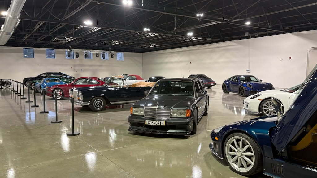 A collection of vehicles at the Archive Motor Club showroom.