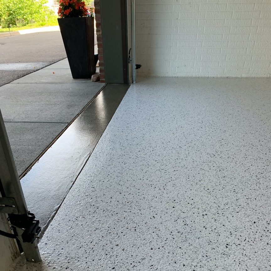 White Flake Polyaspartic Garage Floor