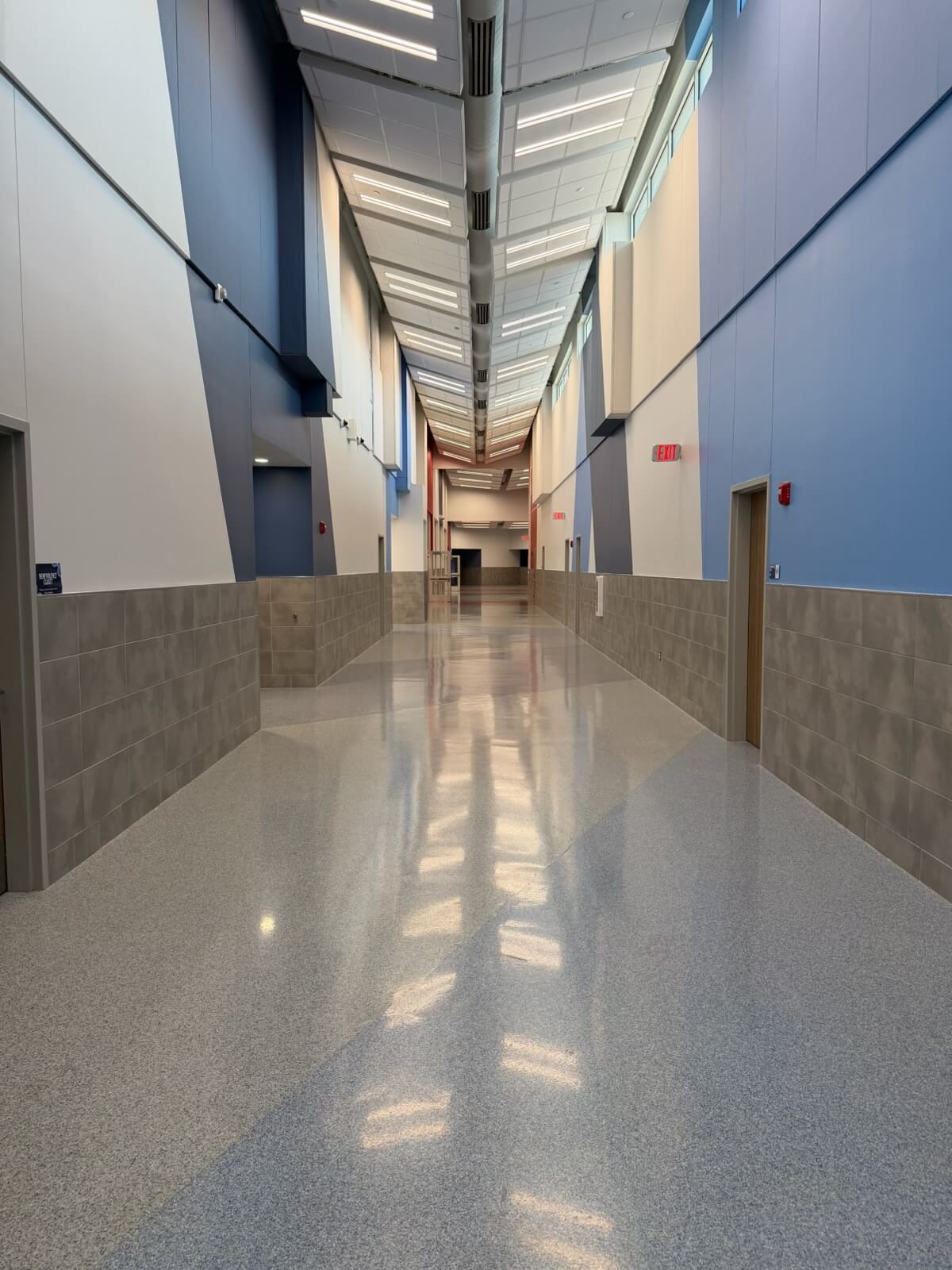 greenwood-isd-skylit-corridor-flake-floor